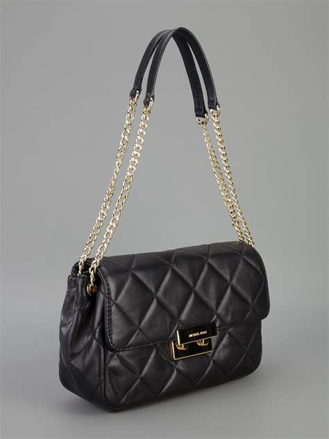 michael kors black quilted flap bag|Michael Kors black studded handbag.